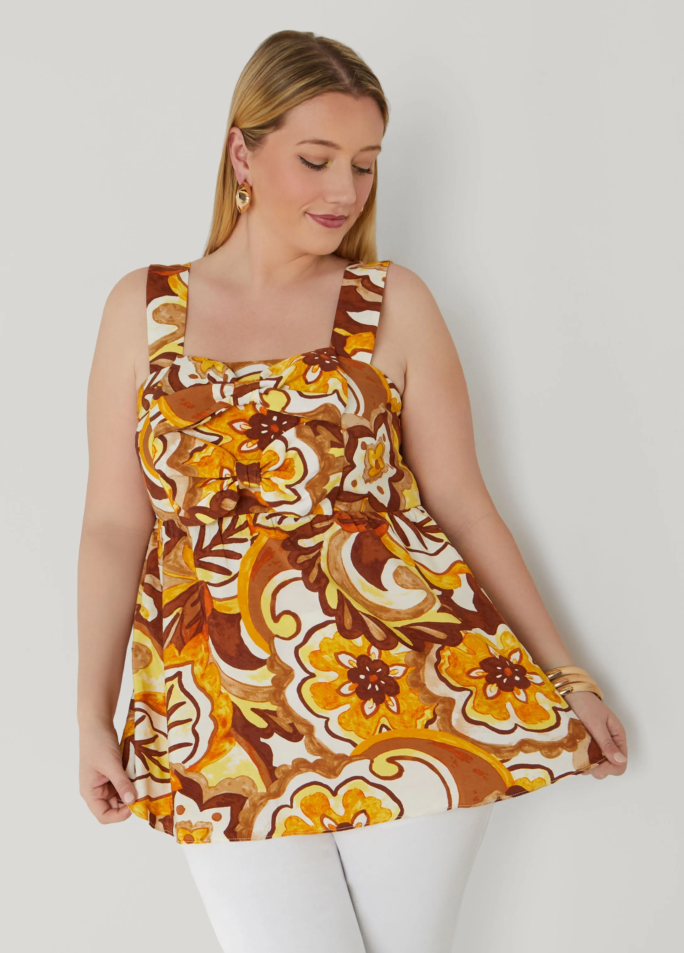 Bow Embellished Floral Top sold by Ashley Stewart