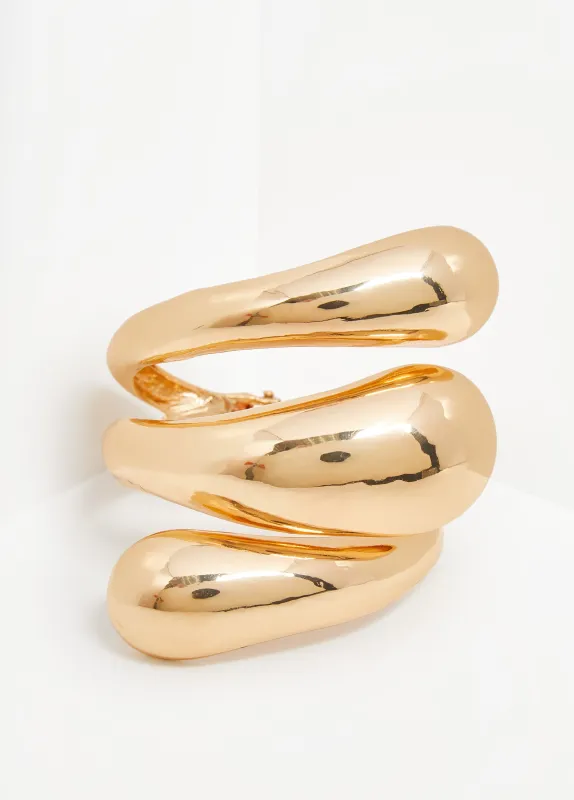 Swirl Gold Tone Cuff sold by Ashley Stewart