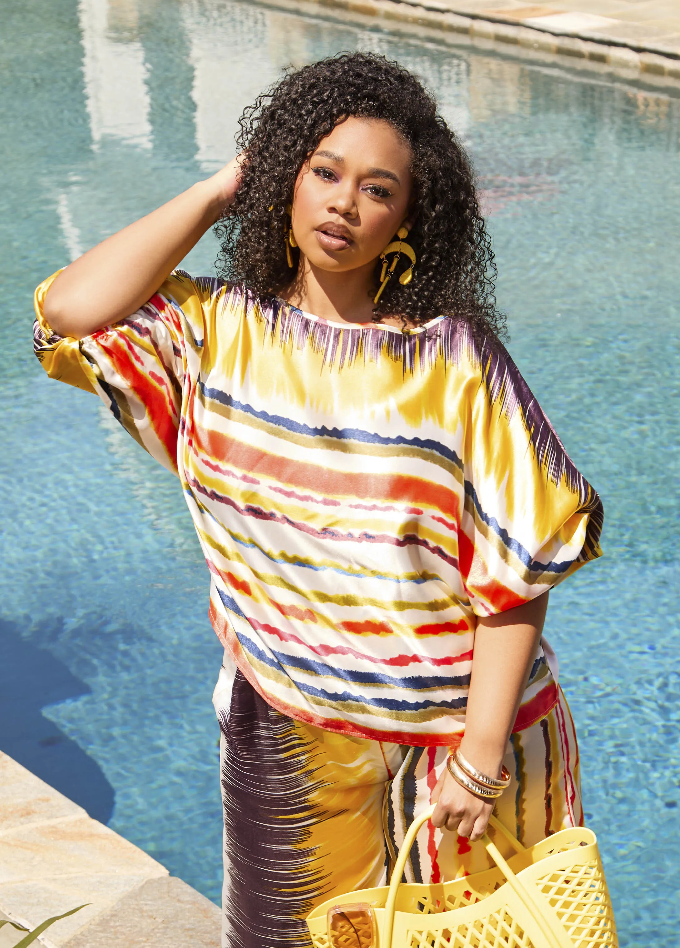 Striped Satin Blouse sold by Ashley Stewart