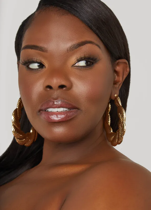 Gold Tone Bamboo Earrings sold by Ashley Stewart