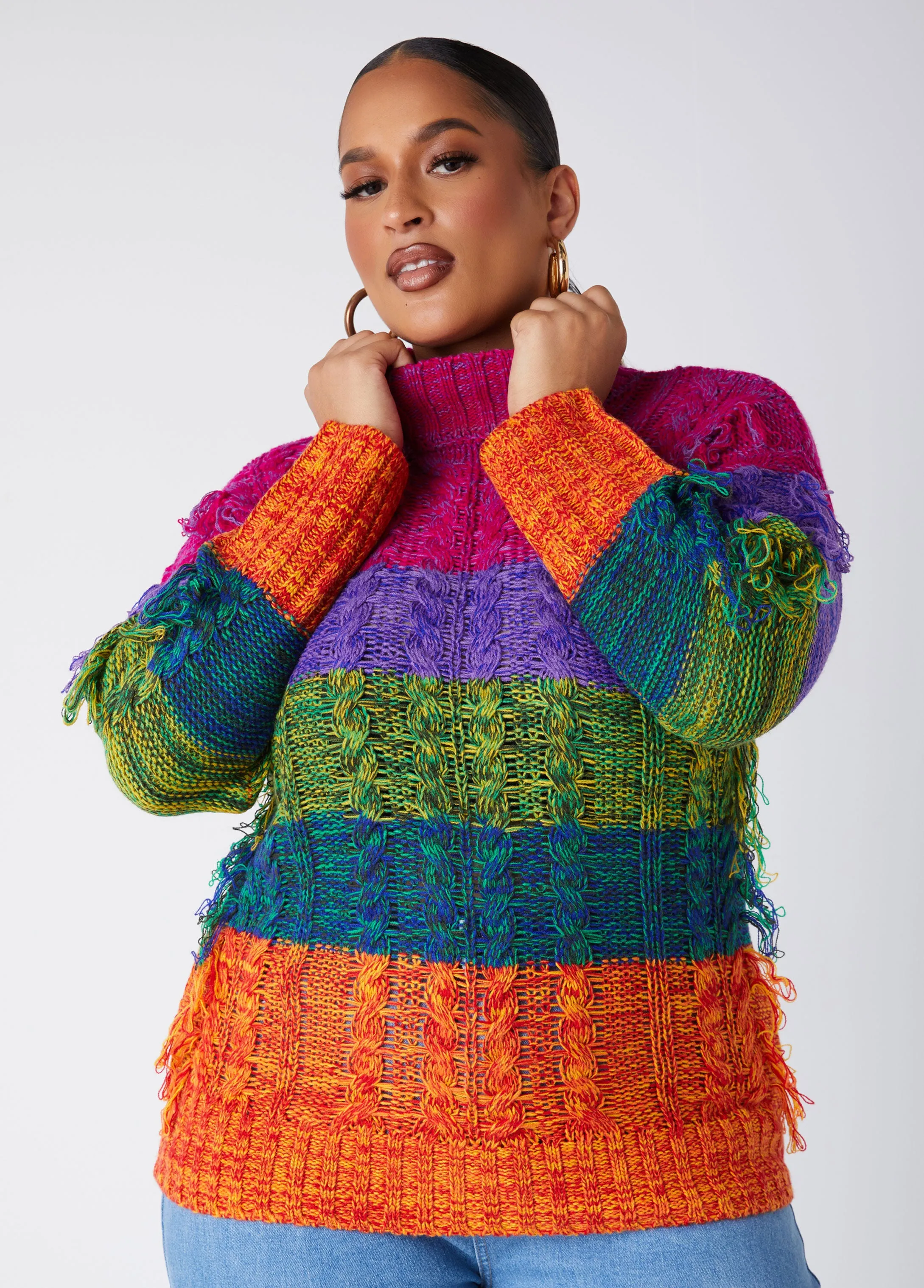 Fringed Rainbow Cable Knit Sweater sold by Ashley Stewart