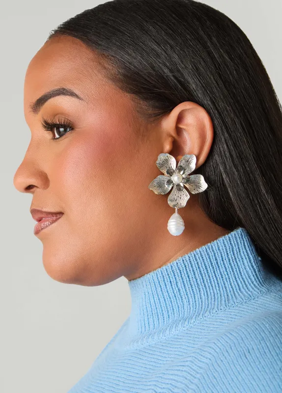 Textured Silver Tone Flower Earrings sold by Ashley Stewart