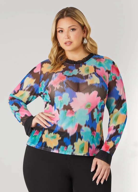 Ruffle Trimmed Printed Mesh Top sold by Ashley Stewart
