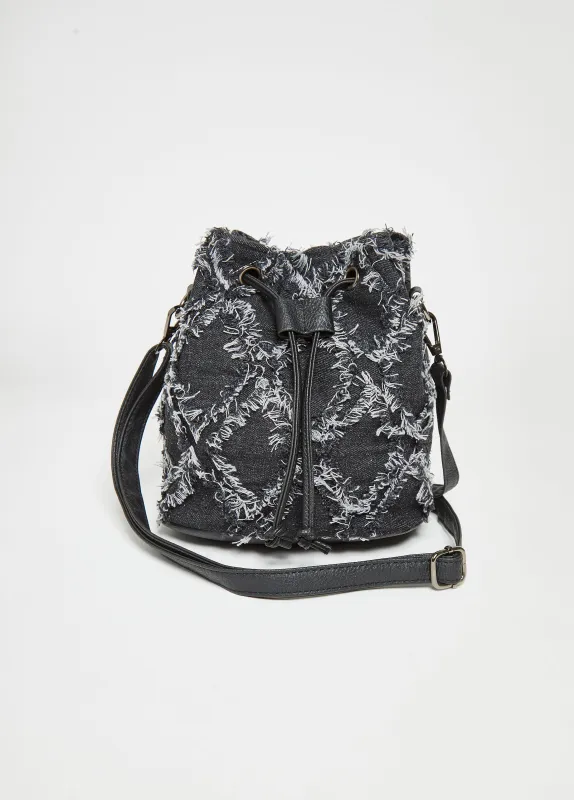 Distressed Denim Buckle Bag sold by Ashley Stewart