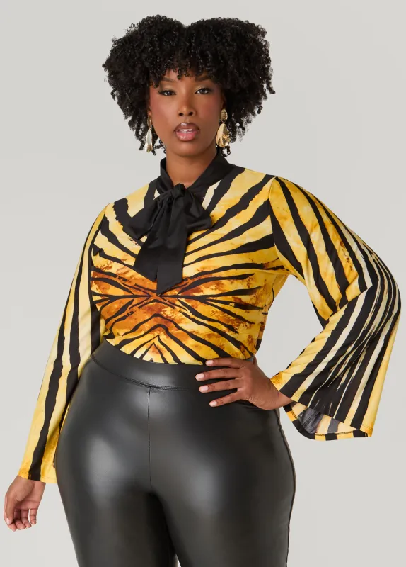 Printed Tie Neck Top sold by Ashley Stewart