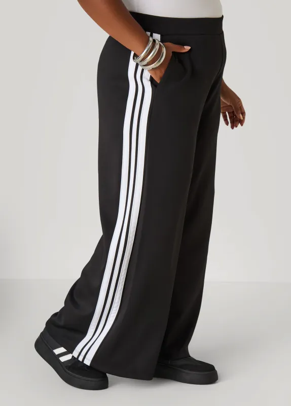 Striped Wide Leg Track Pants sold by Ashley Stewart