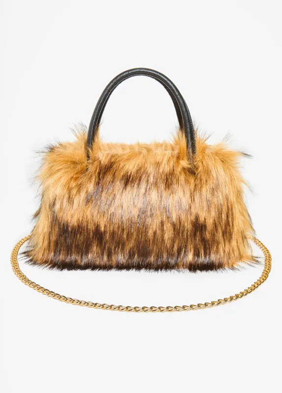 Two Tone Faux Fur Satchel sold by Ashley Stewart