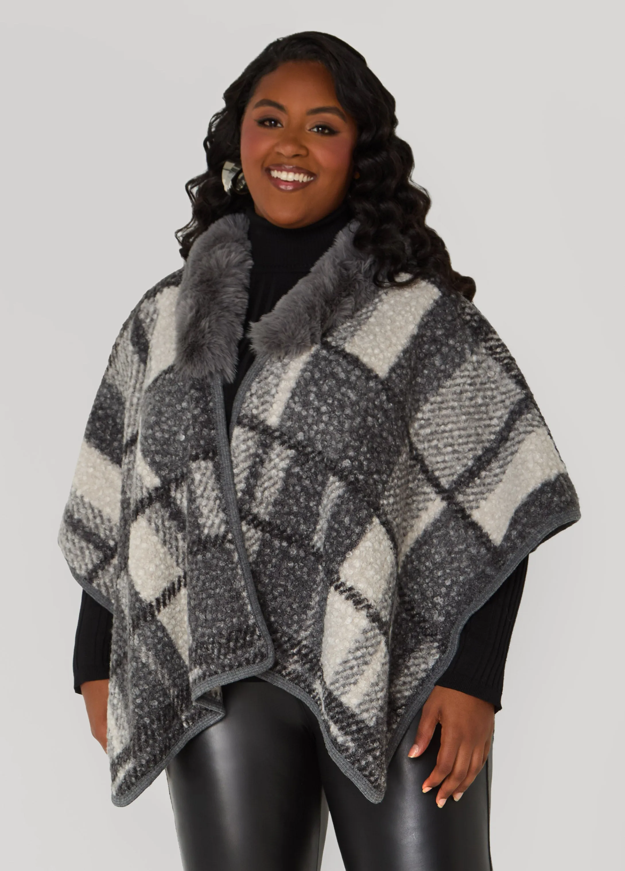 Faux Fur And Plaid Boucle Poncho sold by Ashley Stewart