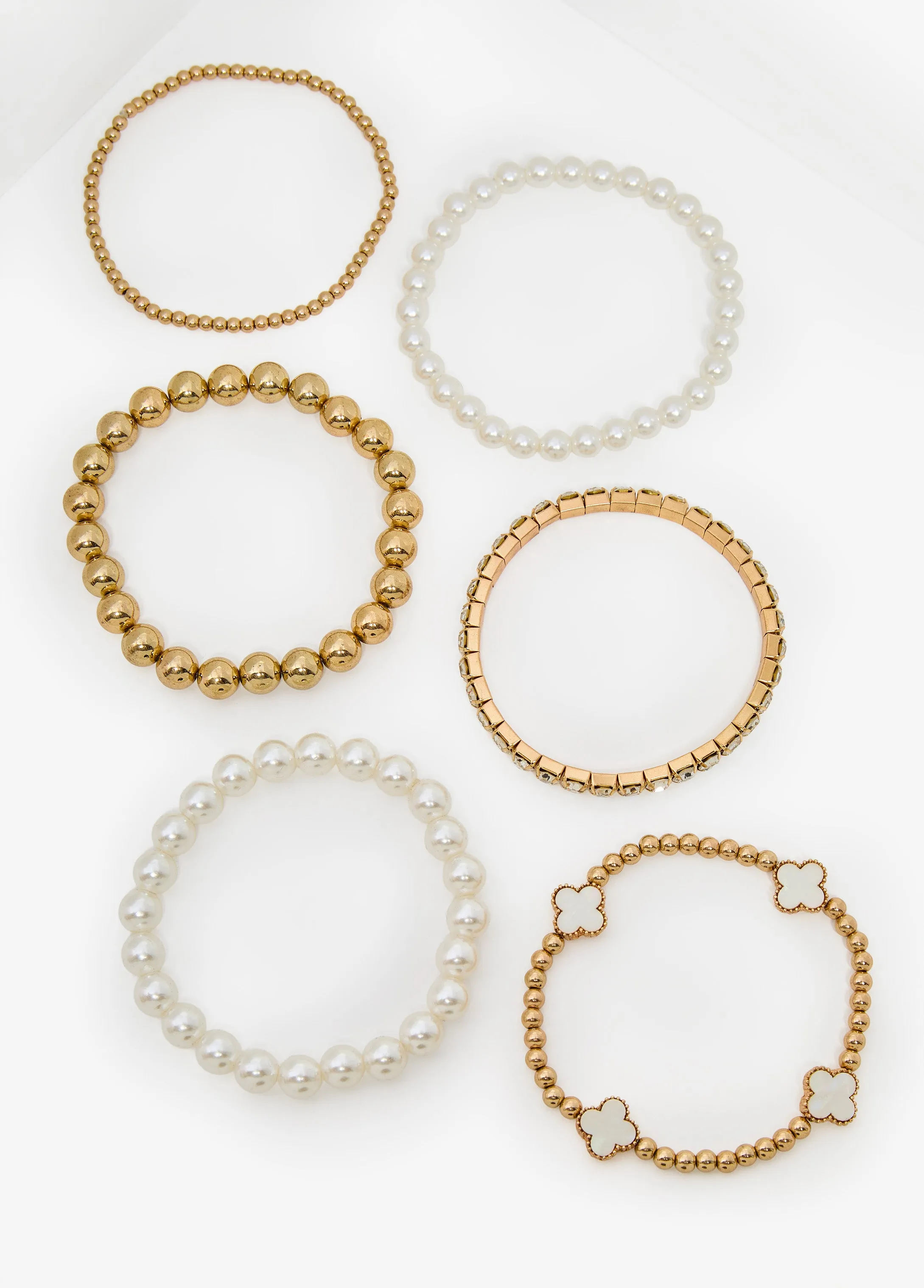 Gold Tone Clover Bracelets sold by Ashley Stewart