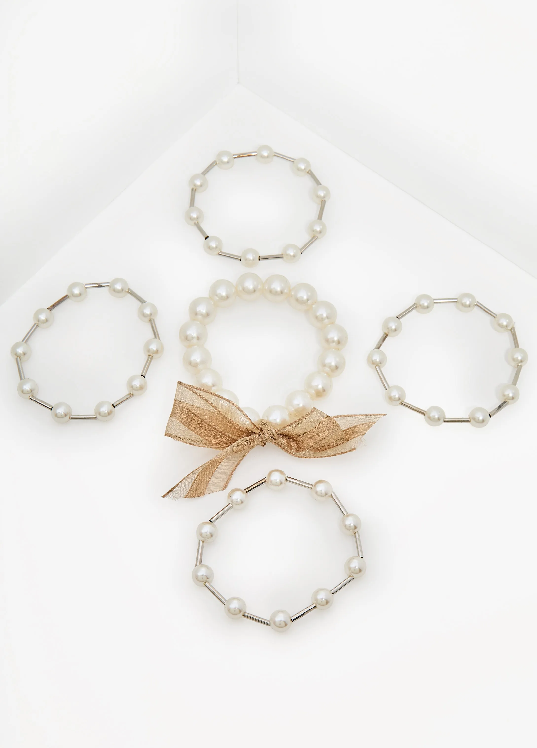 Faux Pearl And Silver Bracelets sold by Ashley Stewart