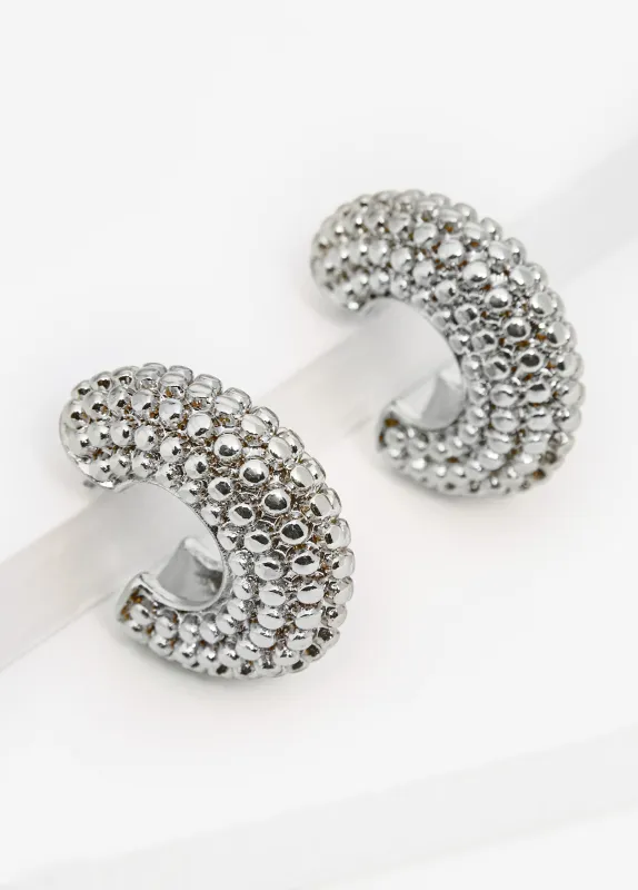 Textured Silver Tone Huggie Earrings sold by Ashley Stewart