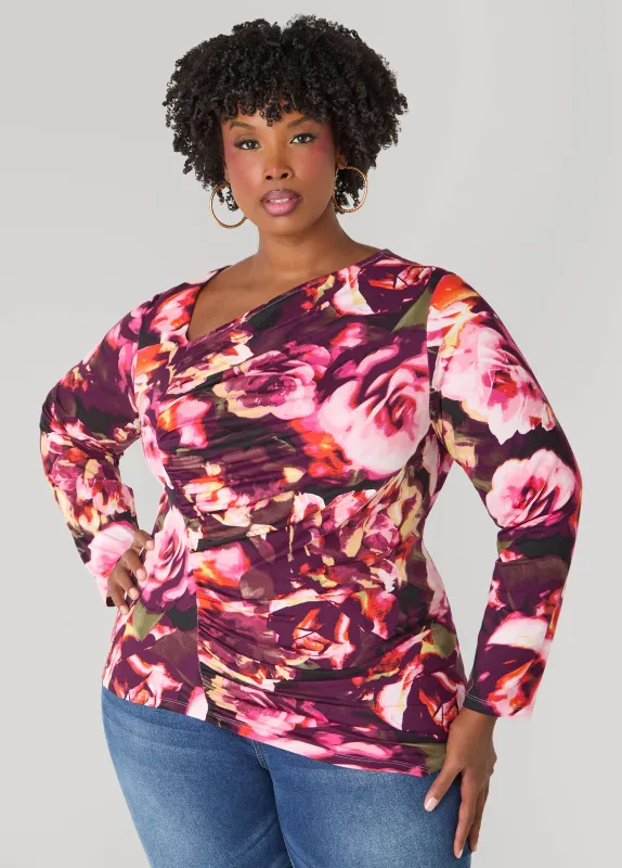 Asymmetric Floral Top sold by Ashley Stewart