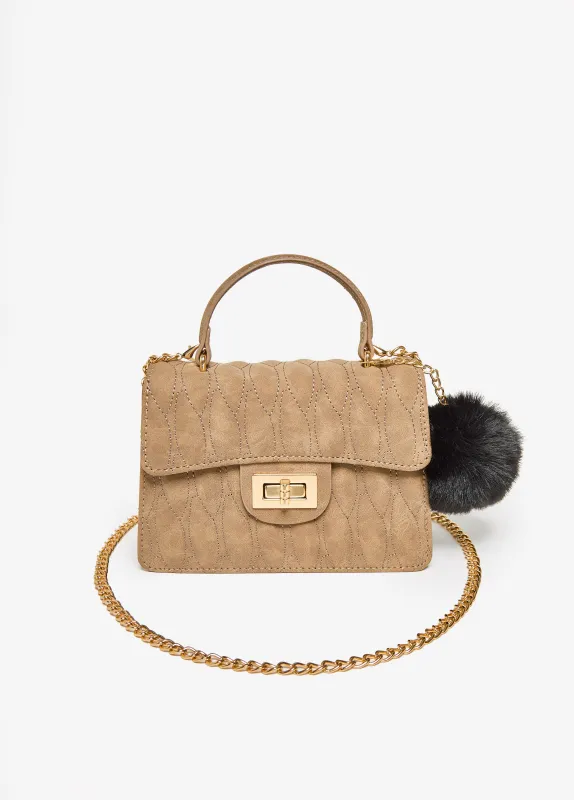Pompom Faux Suede Flap Bag sold by Ashley Stewart
