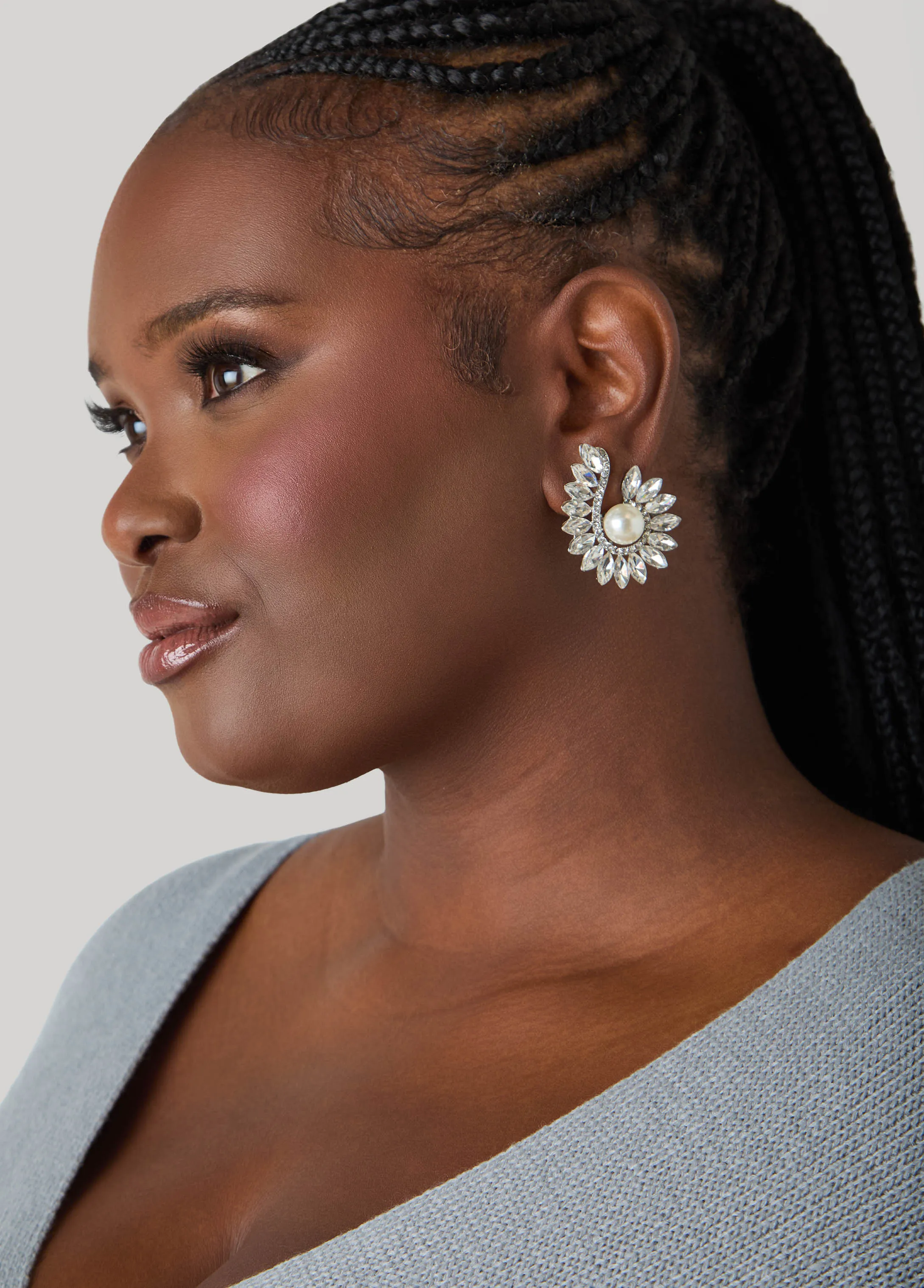 Swirl Crystal Clip On Earrings sold by Ashley Stewart