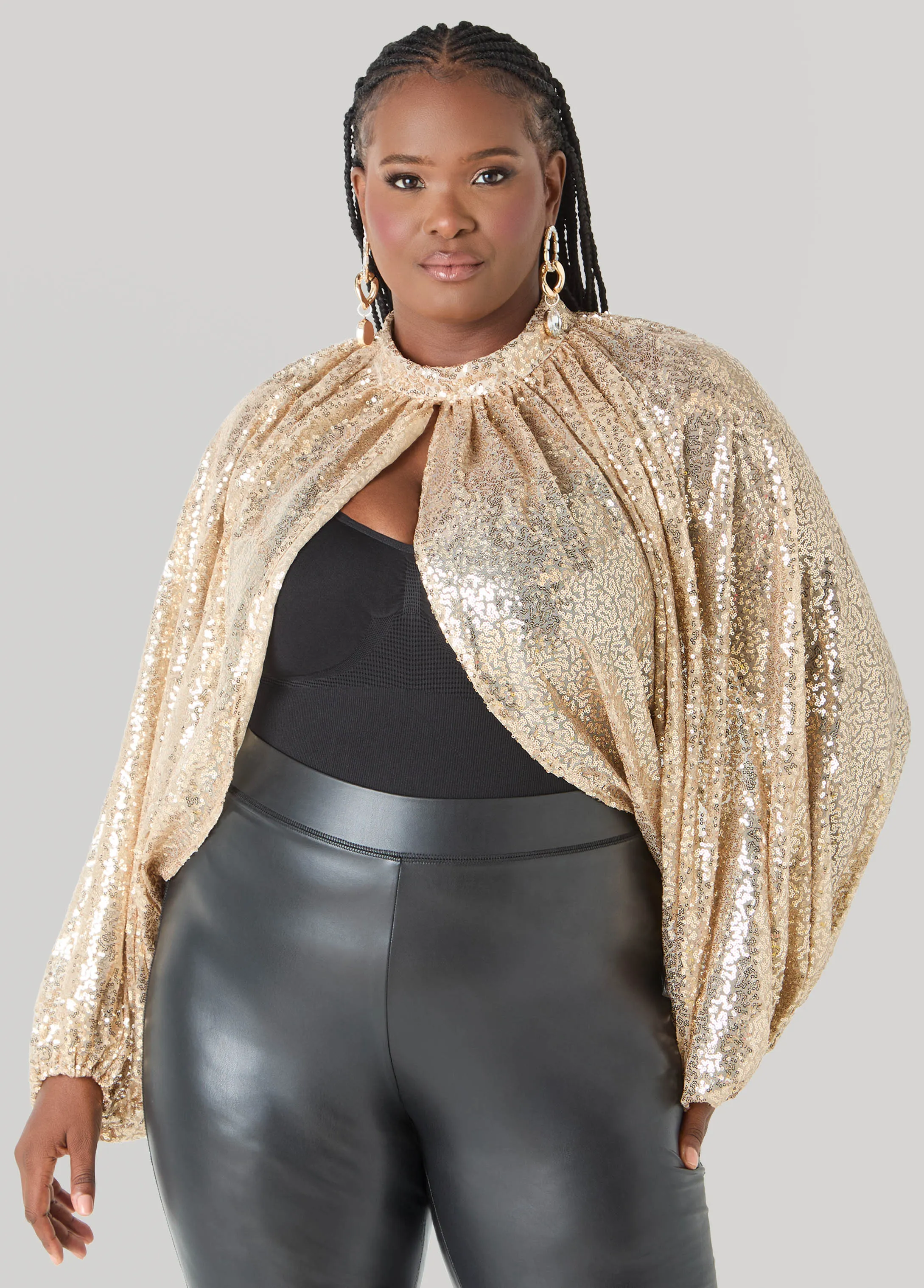 Sequined Mesh Shrug sold by Ashley Stewart