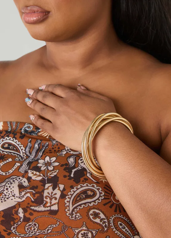 Twisted Omega Gold Tone Bracelet sold by Ashley Stewart