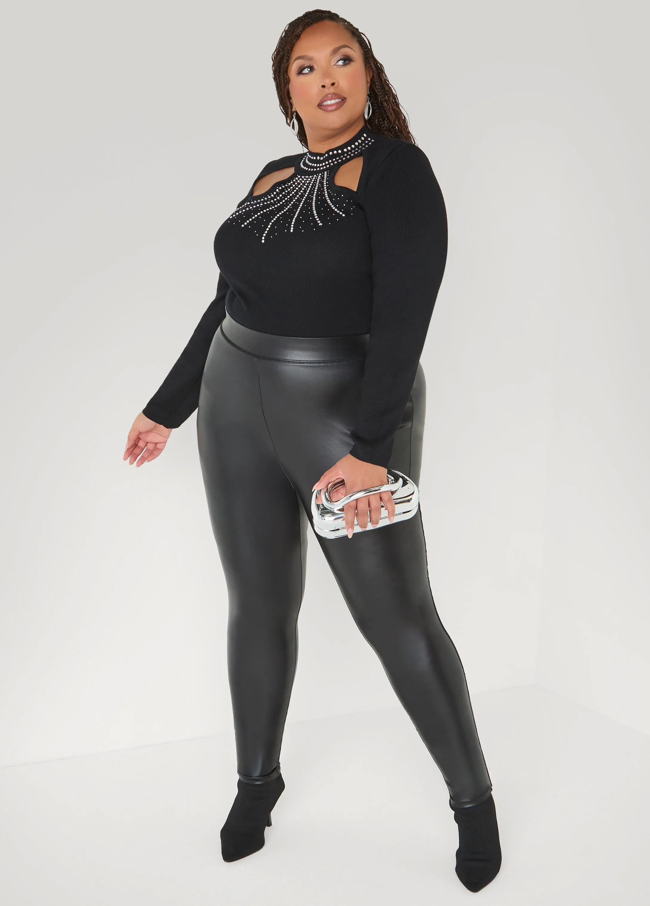 Sculptural Silver Tone Clutch sold by Ashley Stewart