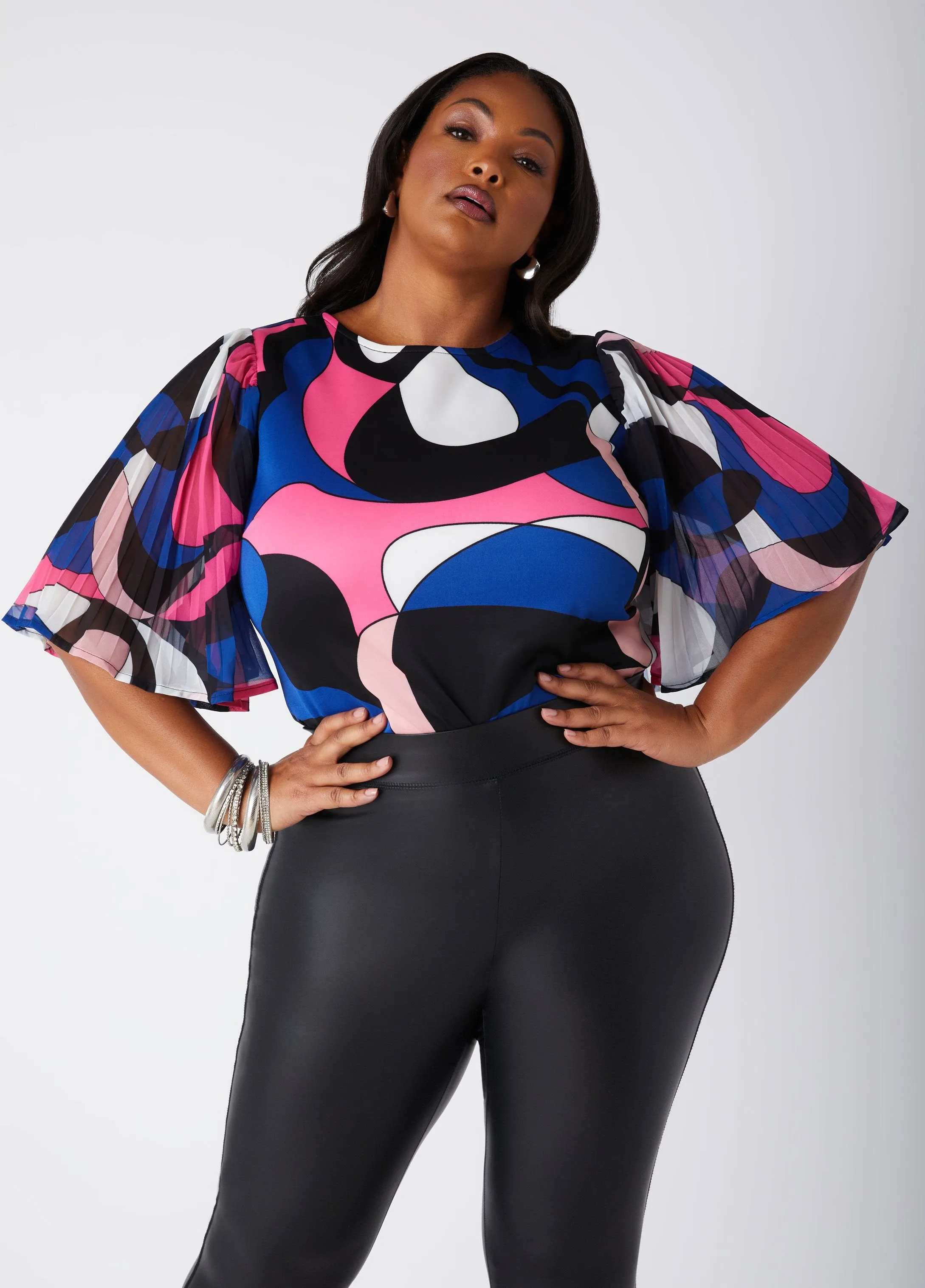 Pleated Paneled Abstract Print Top sold by Ashley Stewart