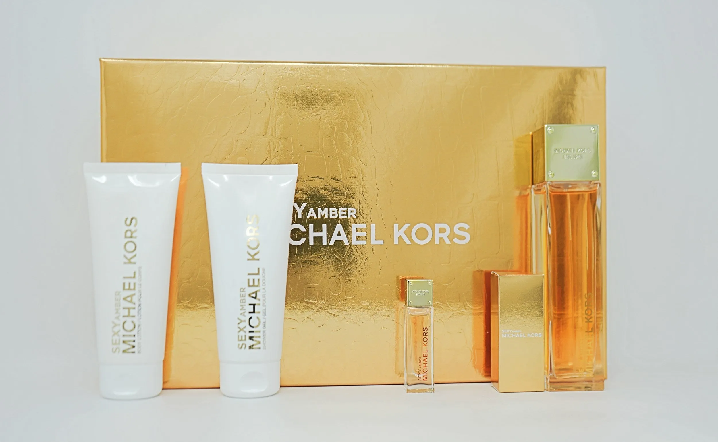 Michael Kors Sexy Amber 4Pc Set sold by Ashley Stewart
