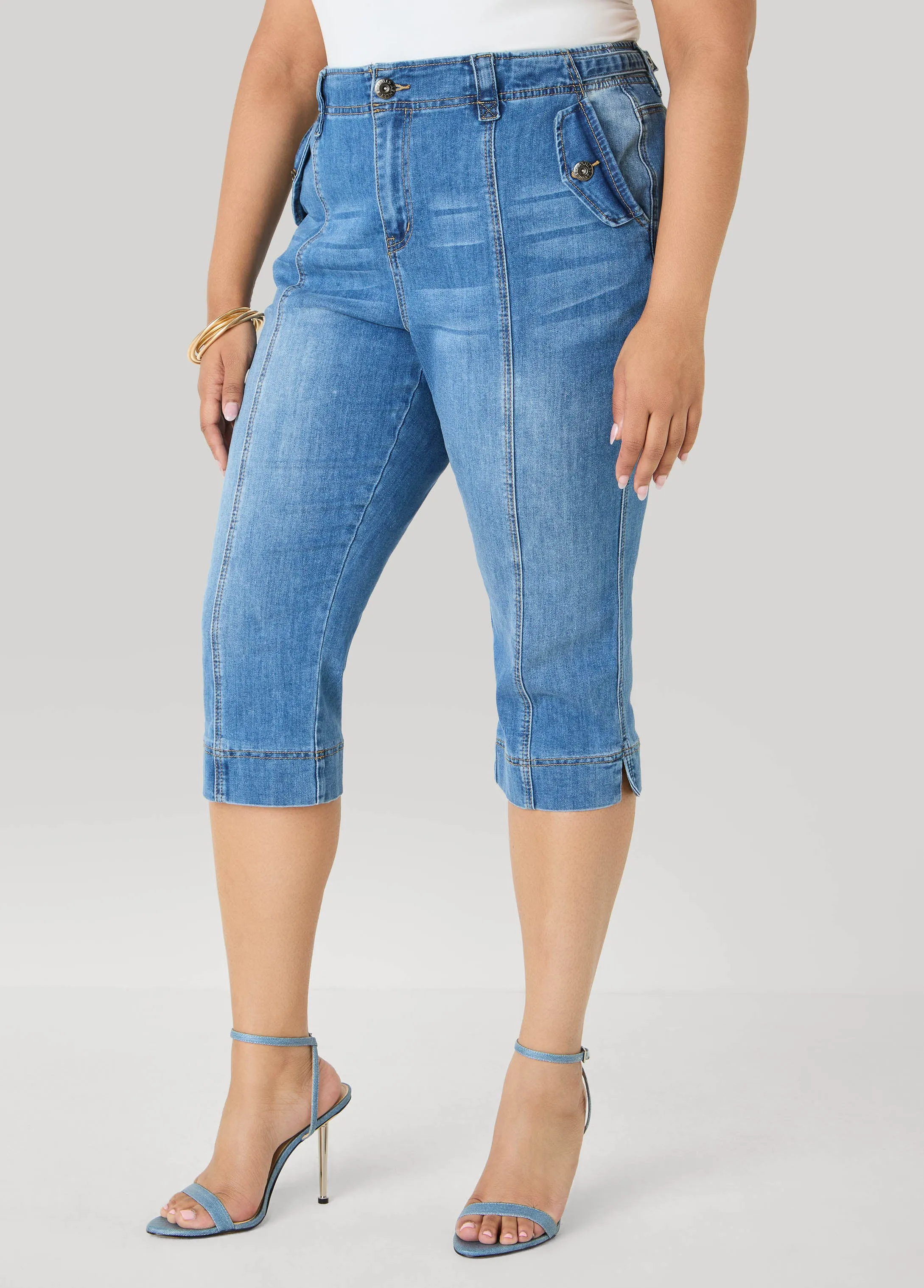 Flap Pocket Seamed Denim Capris sold by Ashley Stewart