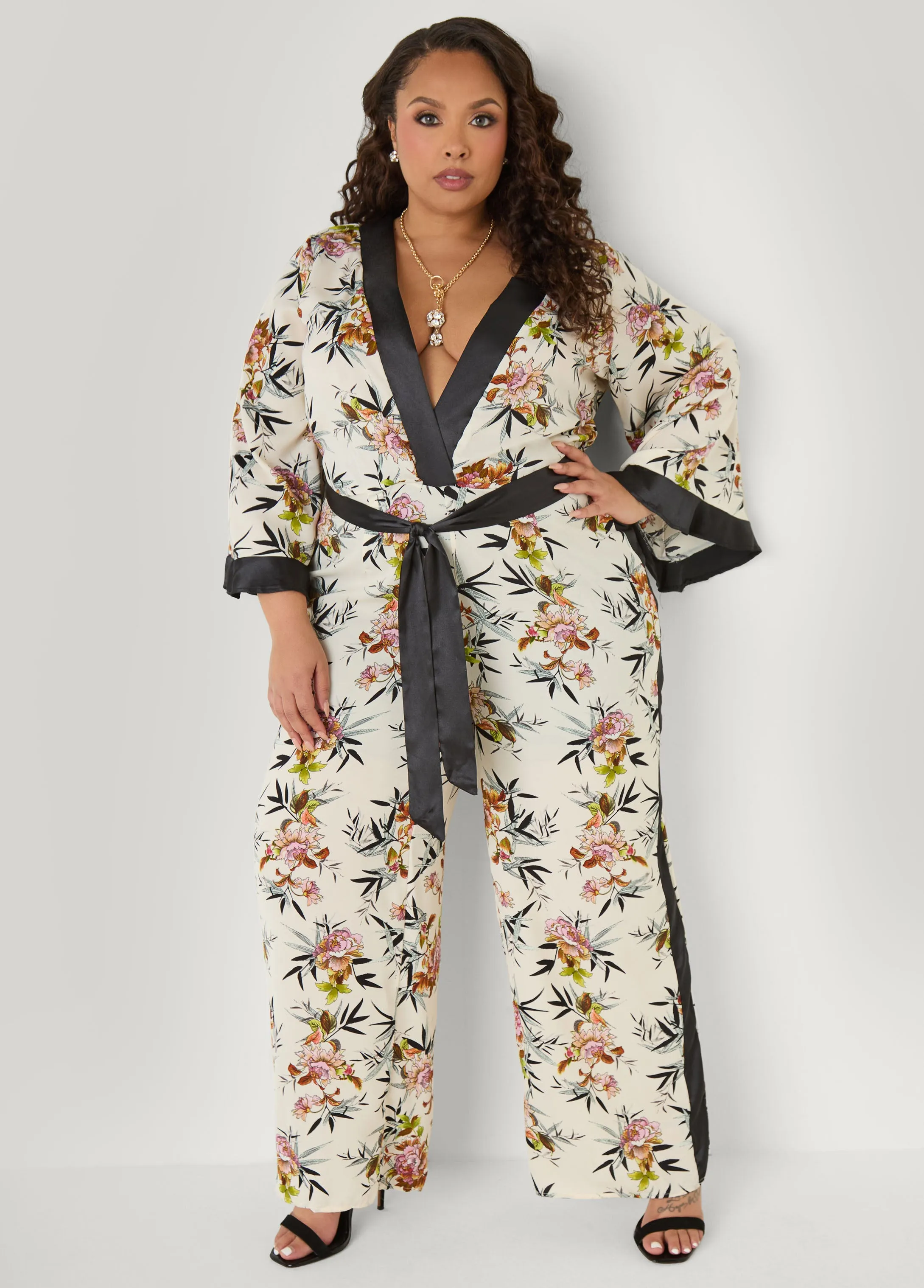 Floral Faux Wrap Jumpsuit sold by Ashley Stewart