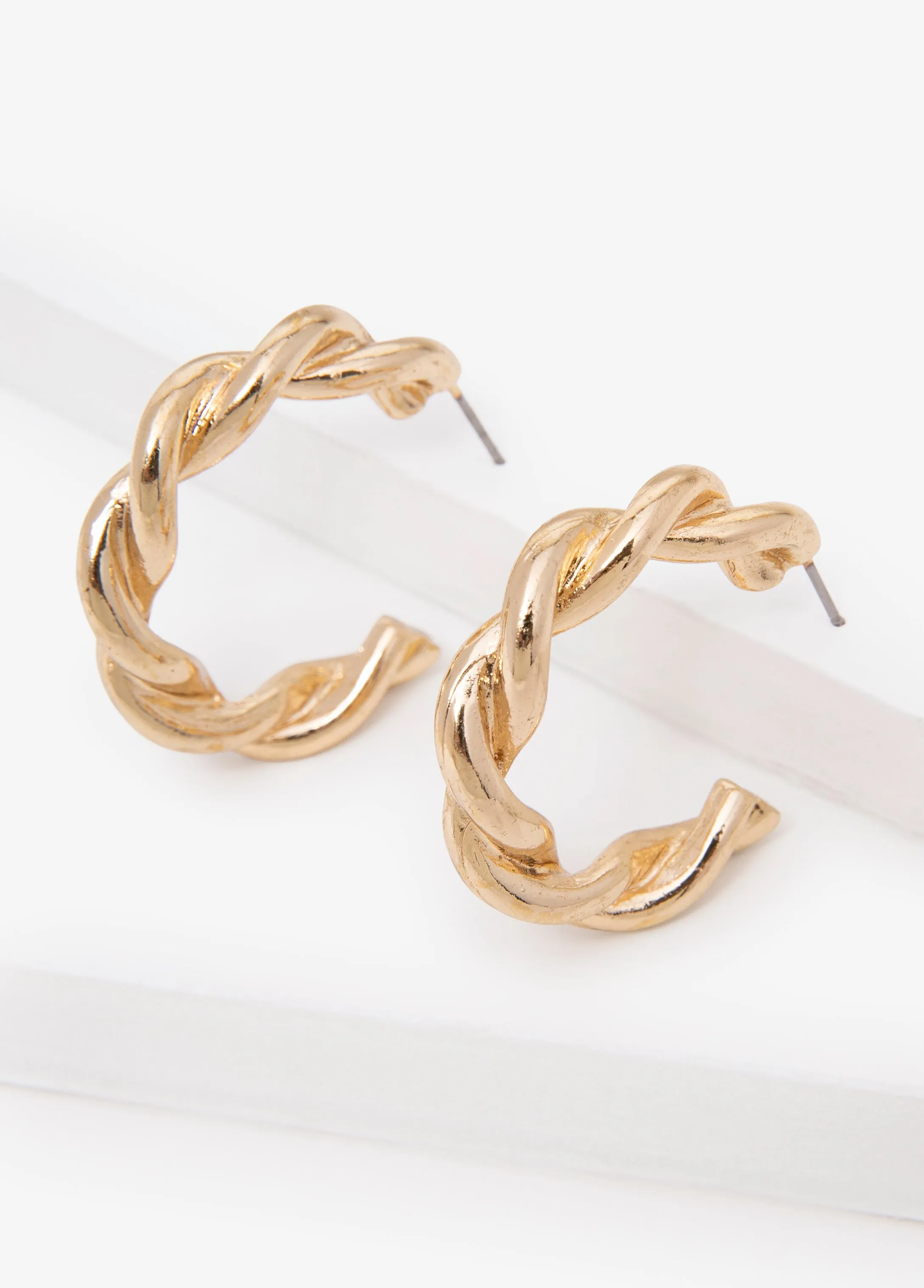Twisted Hoop Earrings sold by Ashley Stewart