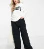 ASOS DESIGN Curve oversized cargo trouser with multi pocket in black sold by ASOS