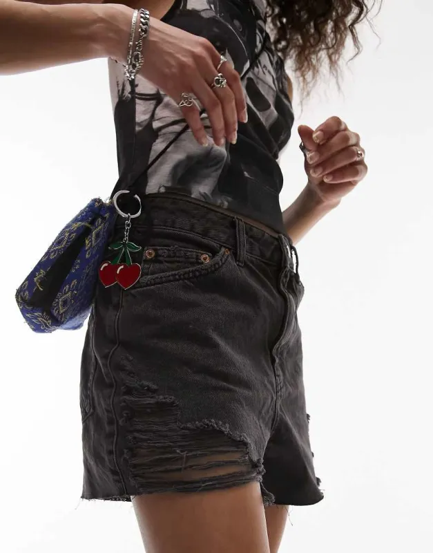 Topshop denim a-line Mom shorts with rips in washed black sold by ASOS
