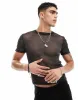ASOS DESIGN muscle fit T-shirt in glitter mesh-Black sold by ASOS