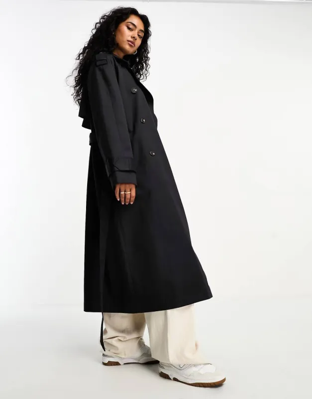 ASOS DESIGN longline trench coat in black sold by ASOS