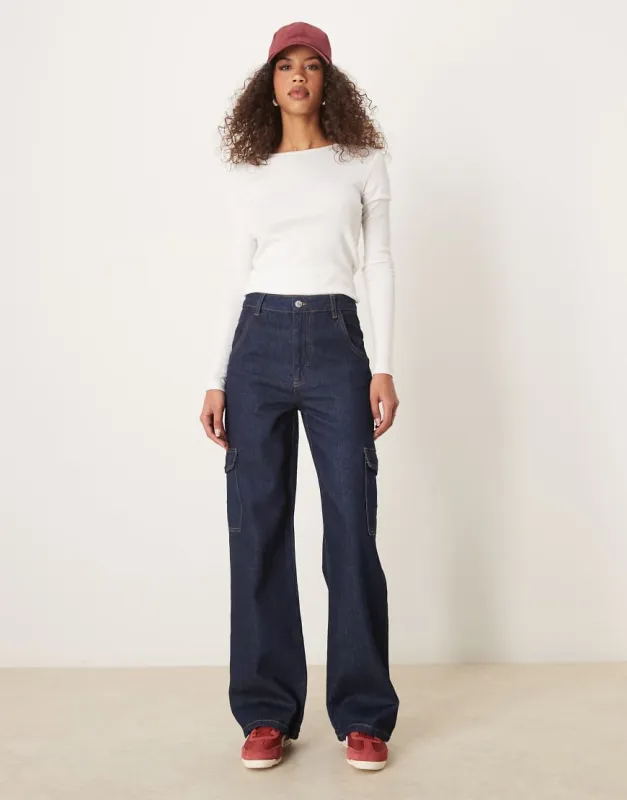 ASOS DESIGN clean carpenter jeans with utility pockets in indigo-Navy sold by ASOS
