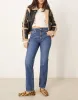 ASOS DESIGN mid rise straight jeans in dark mid wash-Blue sold by ASOS