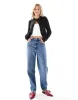 ASOS DESIGN high rise mom jeans in mid blue sold by ASOS