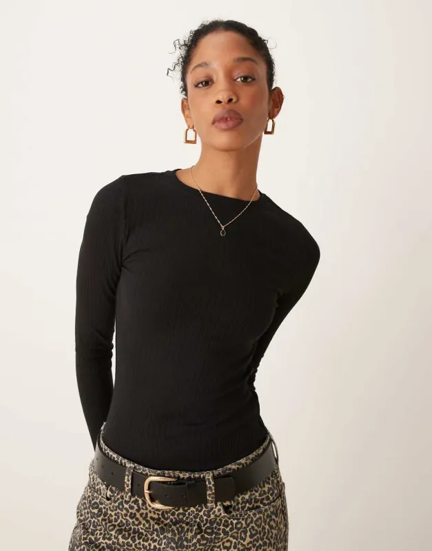 New Look crew neck long sleeve bodysuit in black sold by ASOS