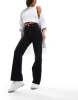 ASOS DESIGN comfort stretch straight leg jean in black sold by ASOS