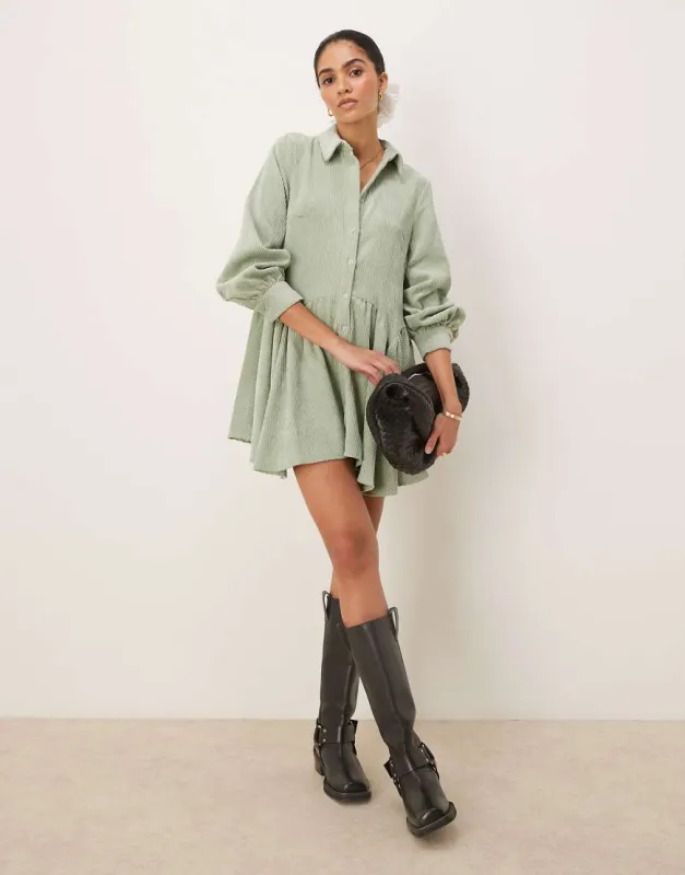 ASOS DESIGN cord smock mini dress with peplum hem in sage green sold by ASOS