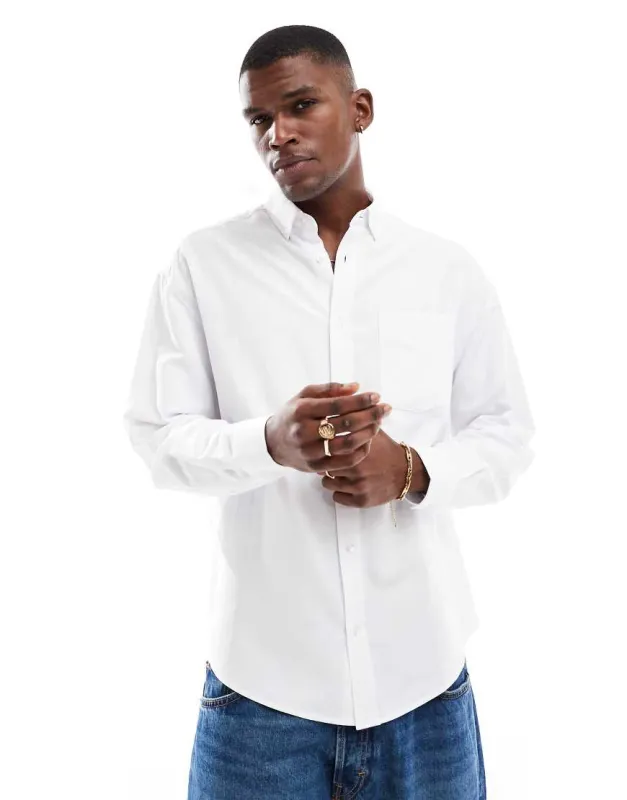 ASOS DESIGN 90s oversized oxford shirt in white sold by ASOS
