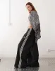 adidas Originals Adicolor wide leg track pants in black sold by ASOS