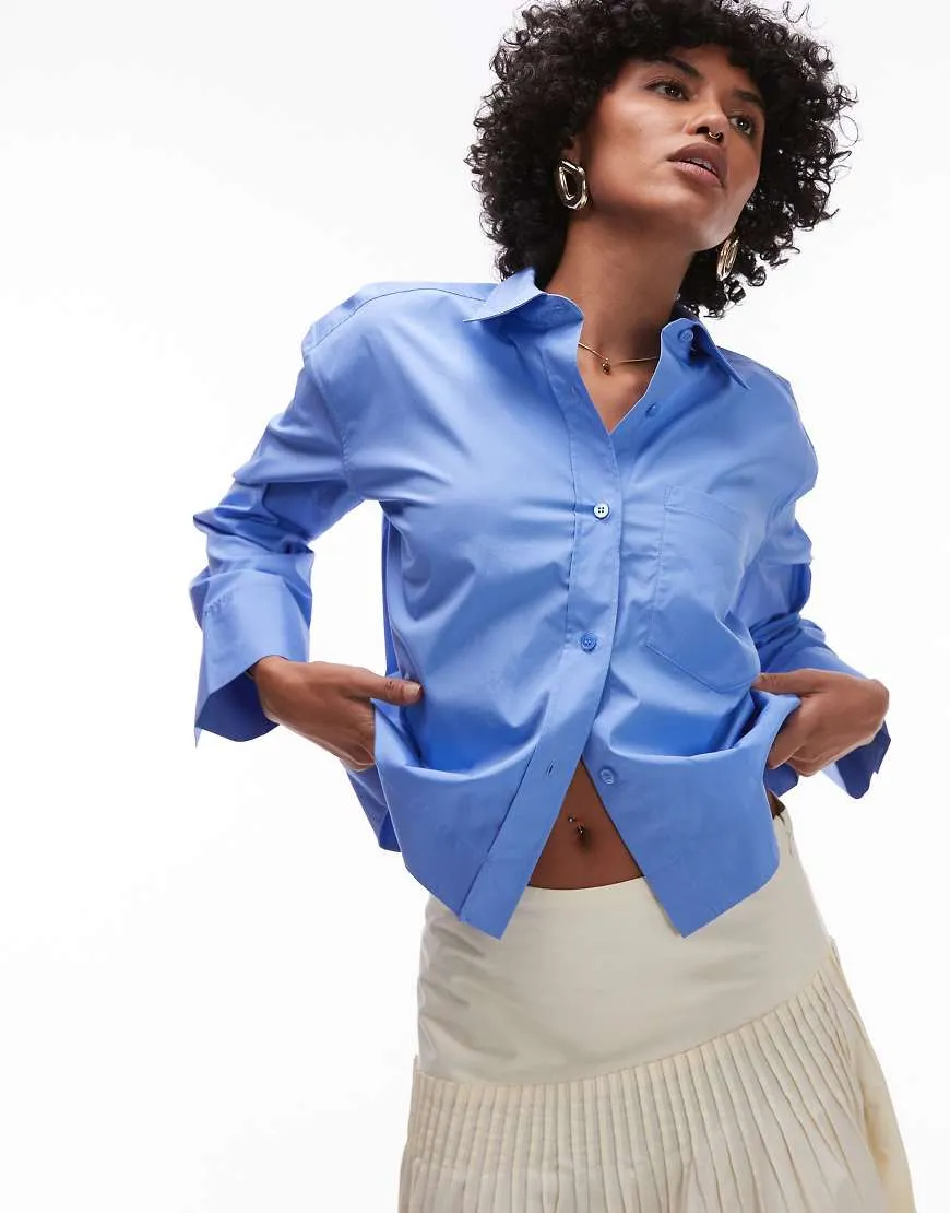 ARKET cropped shirt with front pocket in blue sold by ASOS