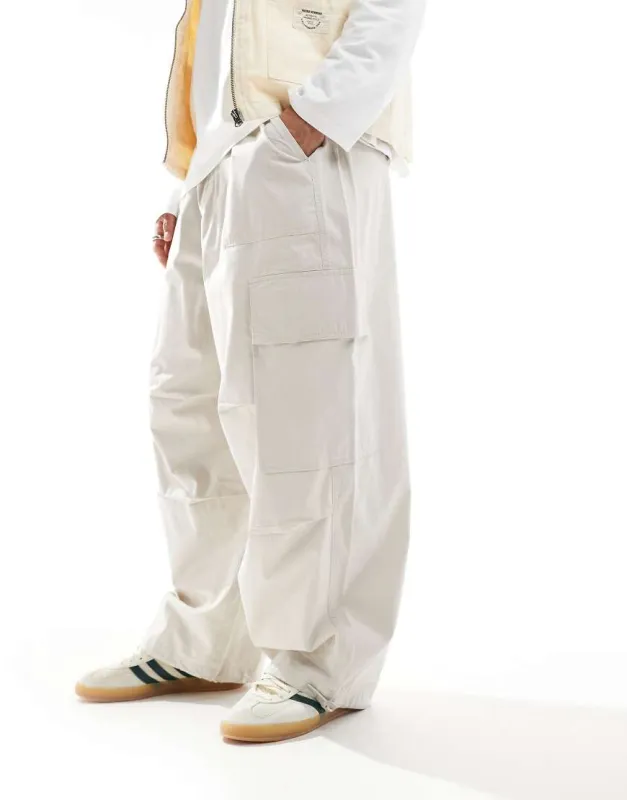 ASOS DESIGN parachute cargo trouser in cream-White sold by ASOS
