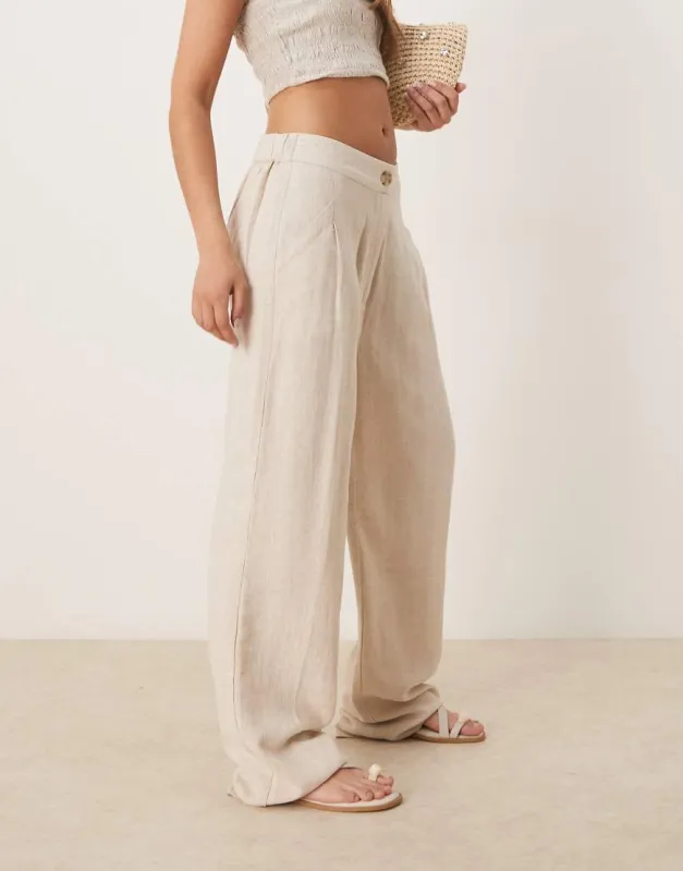 ASOS DESIGN pleat front tapered trousers with linen in stone-Neutral sold by ASOS
