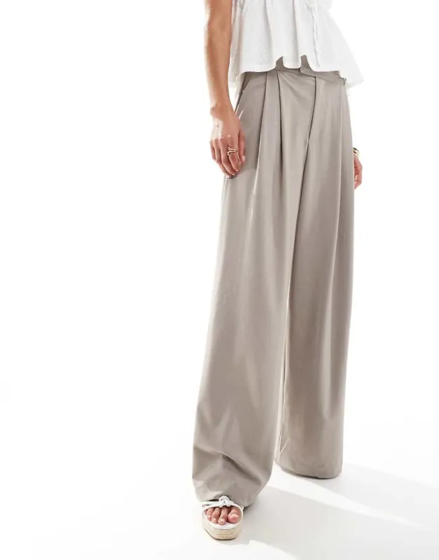 Cotton On izzy pleated suiting pant in taupe marle-Neutral sold by ASOS