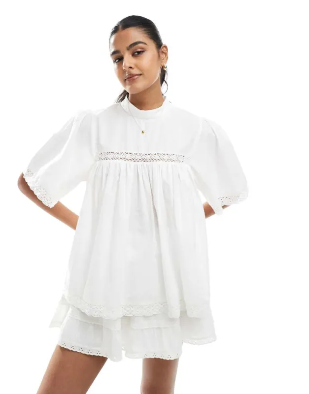 ASOS DESIGN lace insert smock top in white sold by ASOS