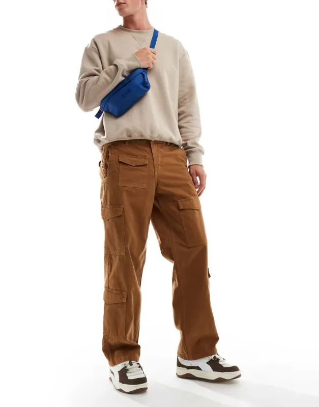 Jack & Jones loose fit multi pocket cargo trouser in tan-Brown sold by ASOS