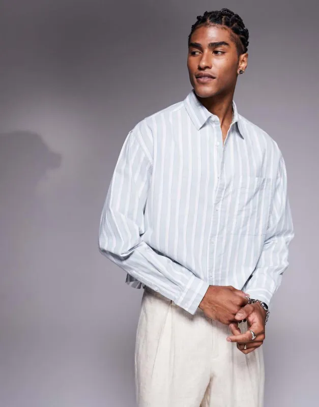 ASOS DESIGN boxy oversized shirt in white and blue stripe sold by ASOS