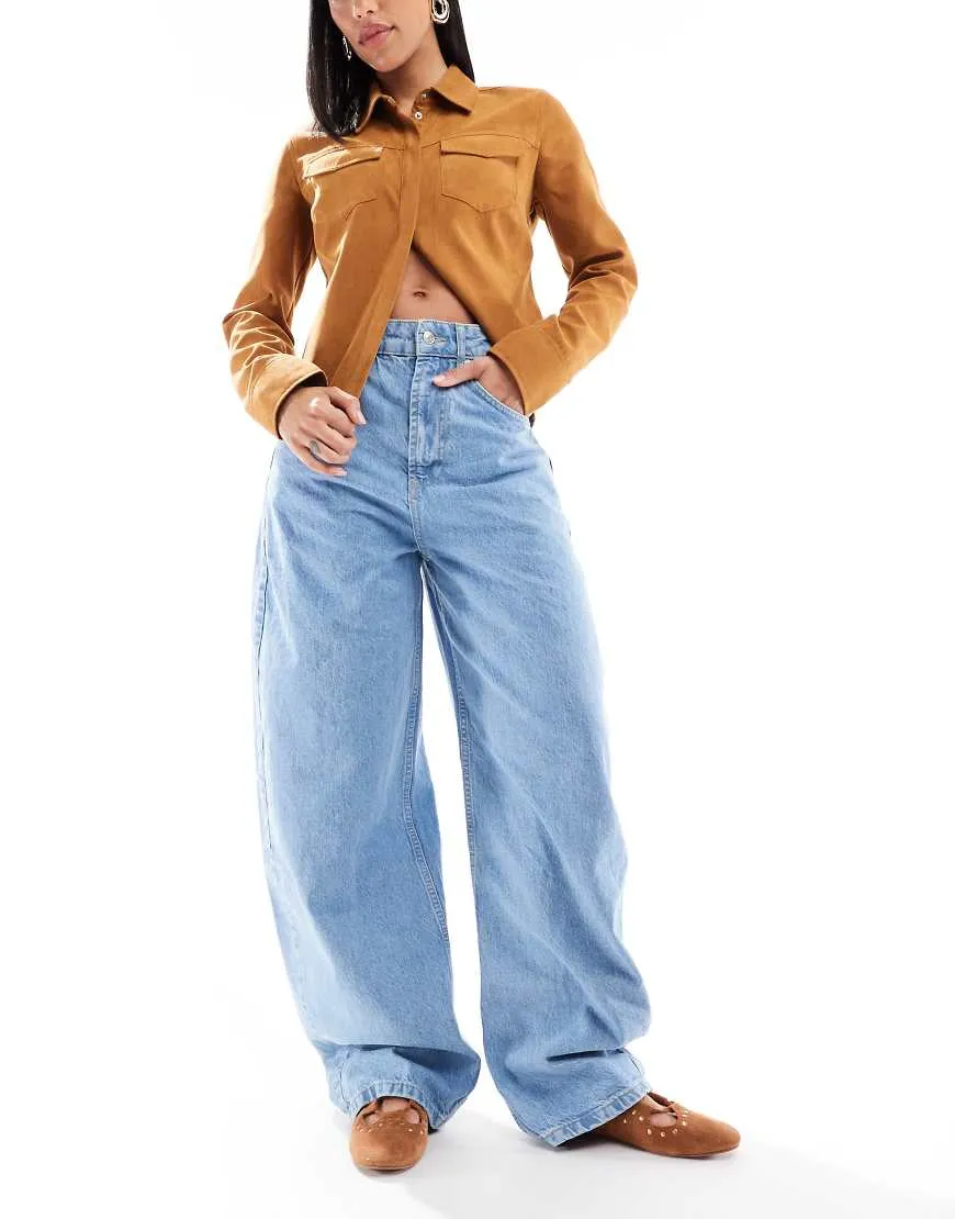 ASOS DESIGN high waisted barrel jeans in light wash-Blue sold by ASOS