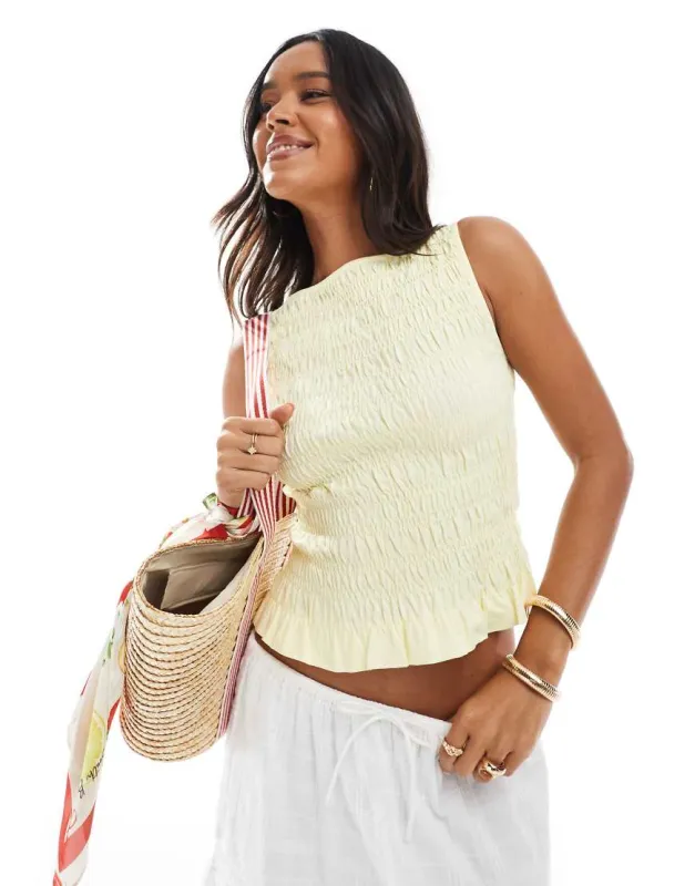 ASOS DESIGN irregular shirred tank in buttermilk-Yellow sold by ASOS