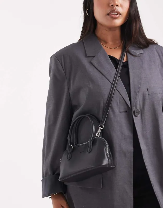 PASQ twin strap mini grab bag in black sold by ASOS