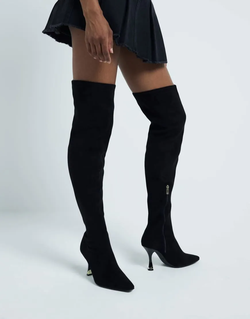 River Island suedette heeled boot in black sold by ASOS