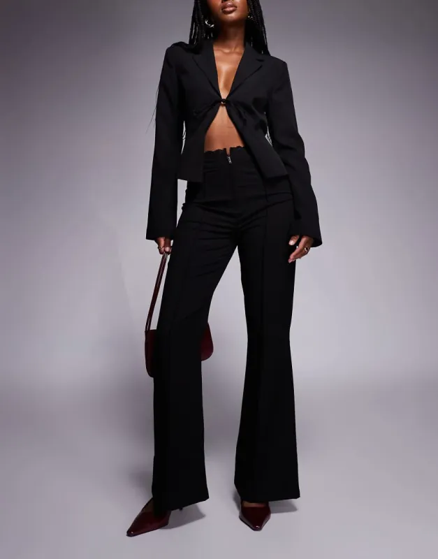 Princess Polly Stellina lace waist trim zip detail slim flared trousers in black sold by ASOS